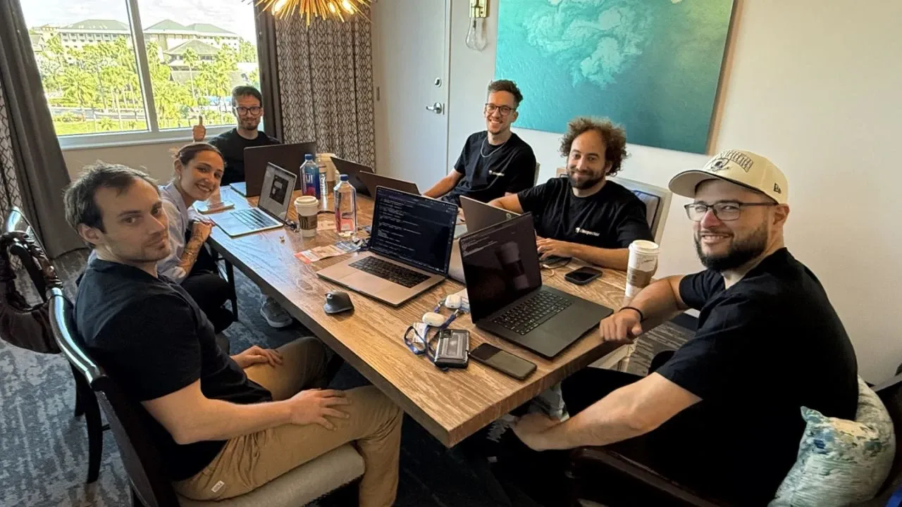 Valentina working around a table with the zInspector developers